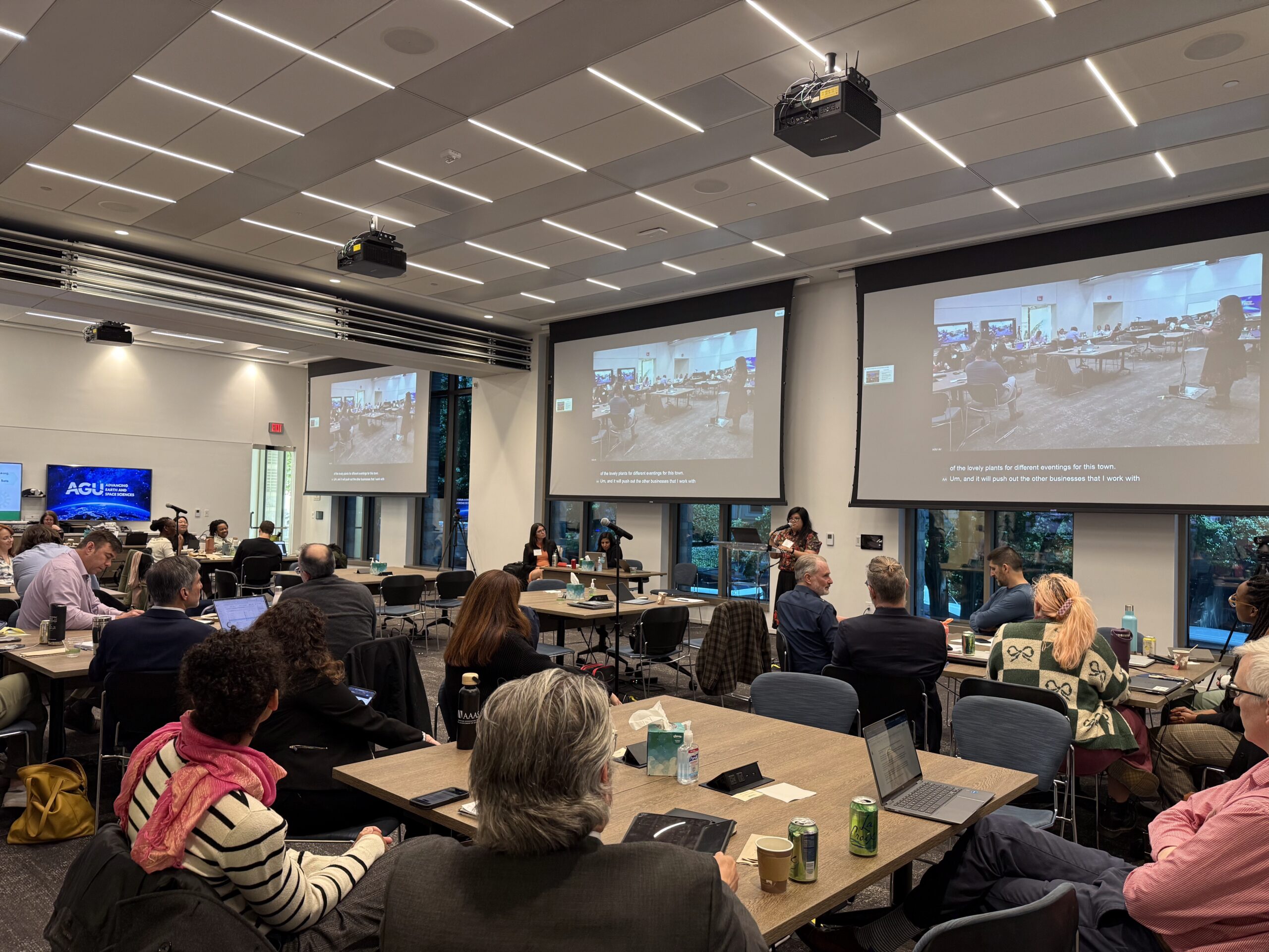 Person speaking at a podium in front of a room of seated people delivering a professional development workshop for AAAS Science & Technology Policy Fellows and alumni in D.C. in April 2026